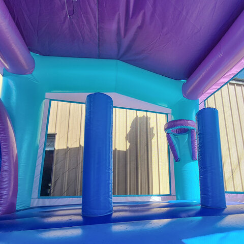 inside blue mermaid bounce house combo FL