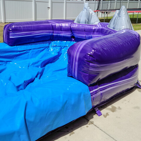 purple water slide pool