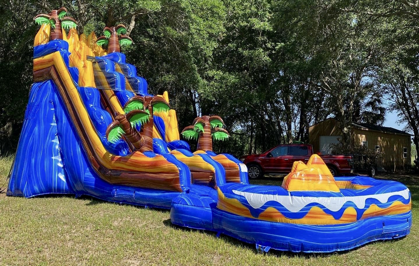 Side view of large water slide inflatable rental