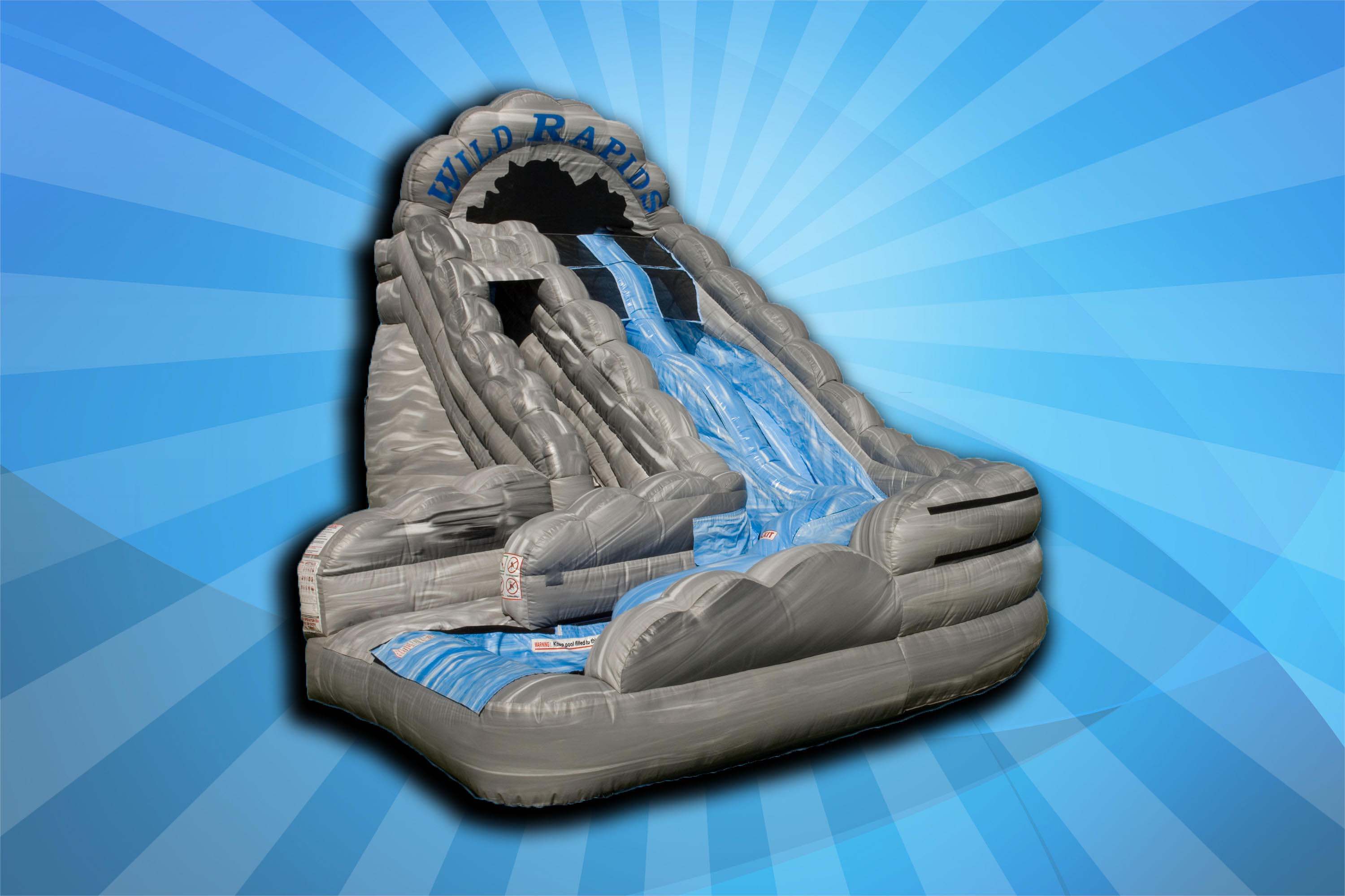 Inflatable water slide against blue background. Inflatable water slide against blue background.