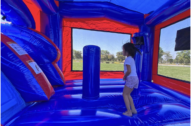 Child enjoying the bounce area inside the Knockout Combo