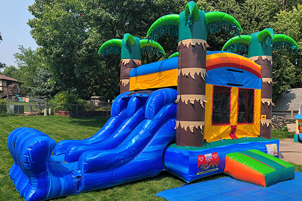 Tropical bounce house rental.