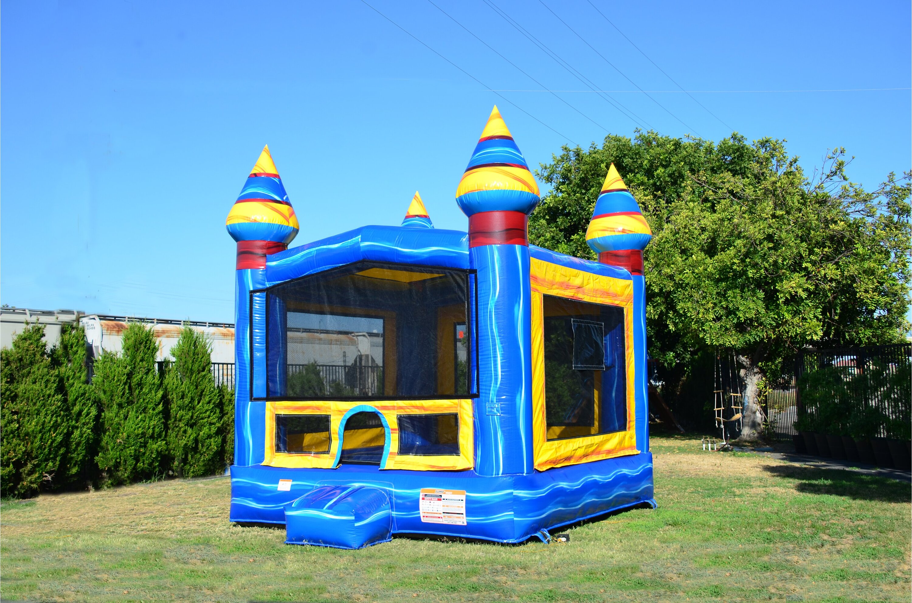 blue and yellow bounce house in kansas city