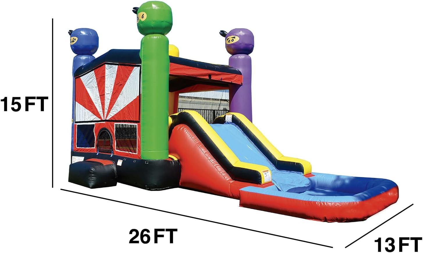 Inflatable ninja bounce house with slide, 26x13x15 ft, in primary colors.