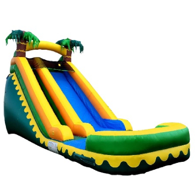 Tropical inflatable water slide on sunny day. 