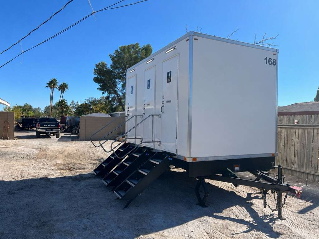 Three stall luxury restroom trailer party rental for weddings corporate events and outdoor celebrations in Arizona