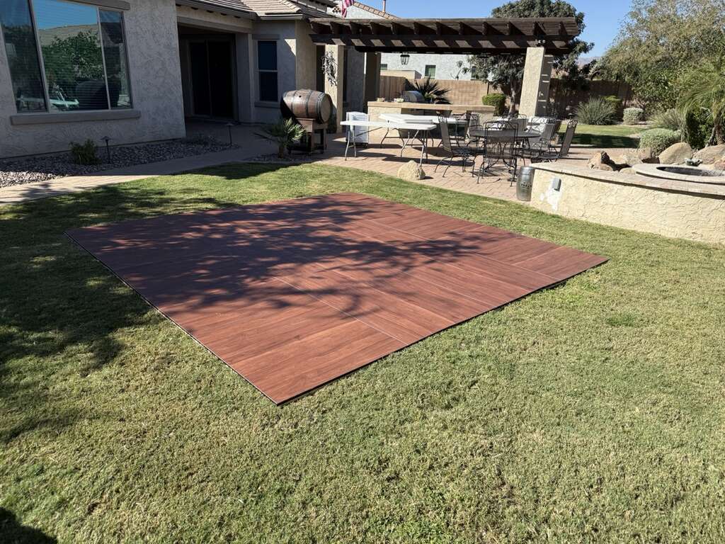 Backyard dance floor rental installed on grass for a Sweet 16 party in Goodyear Arizona