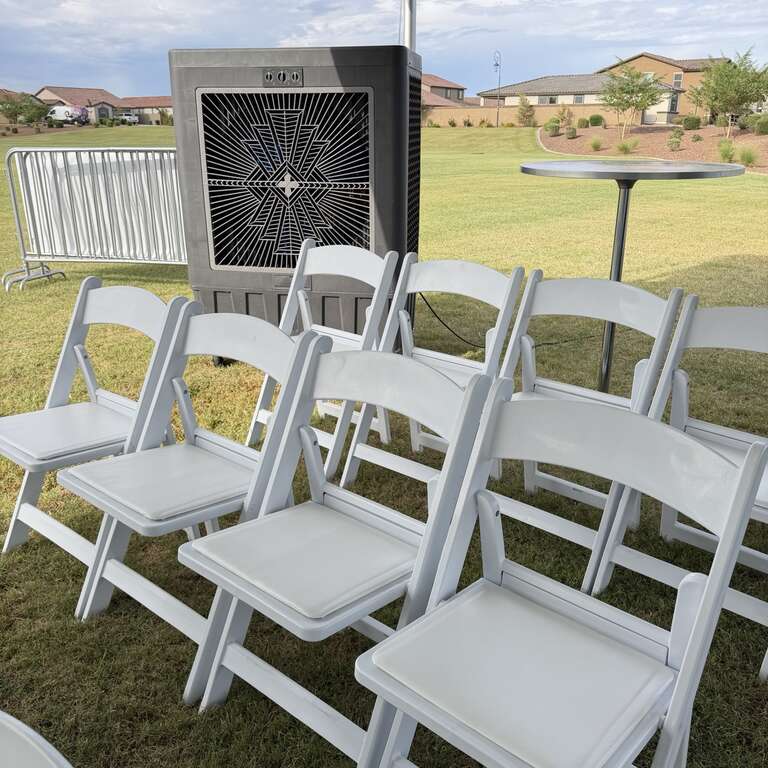 Commercial swamp cooler with white resin chairs at a corporate event in Goodyear Arizona