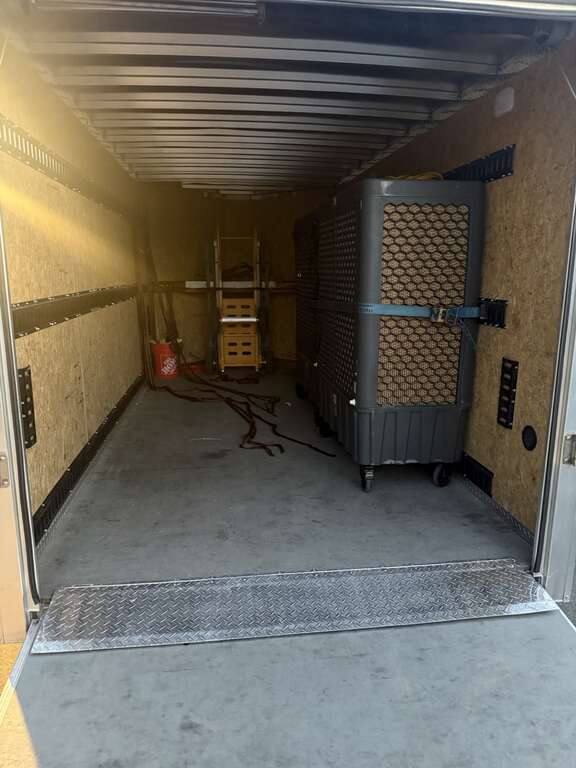 Commercial swamp coolers secured inside an enclosed delivery trailer in Goodyear Arizona