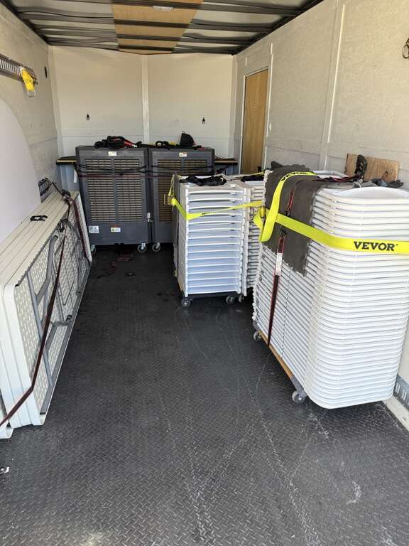 Event trailer loaded with commercial swamp coolers tables and chairs in Goodyear Arizona
