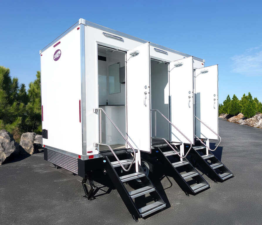 3-stall bathroom trailer with three private entrances and doors open