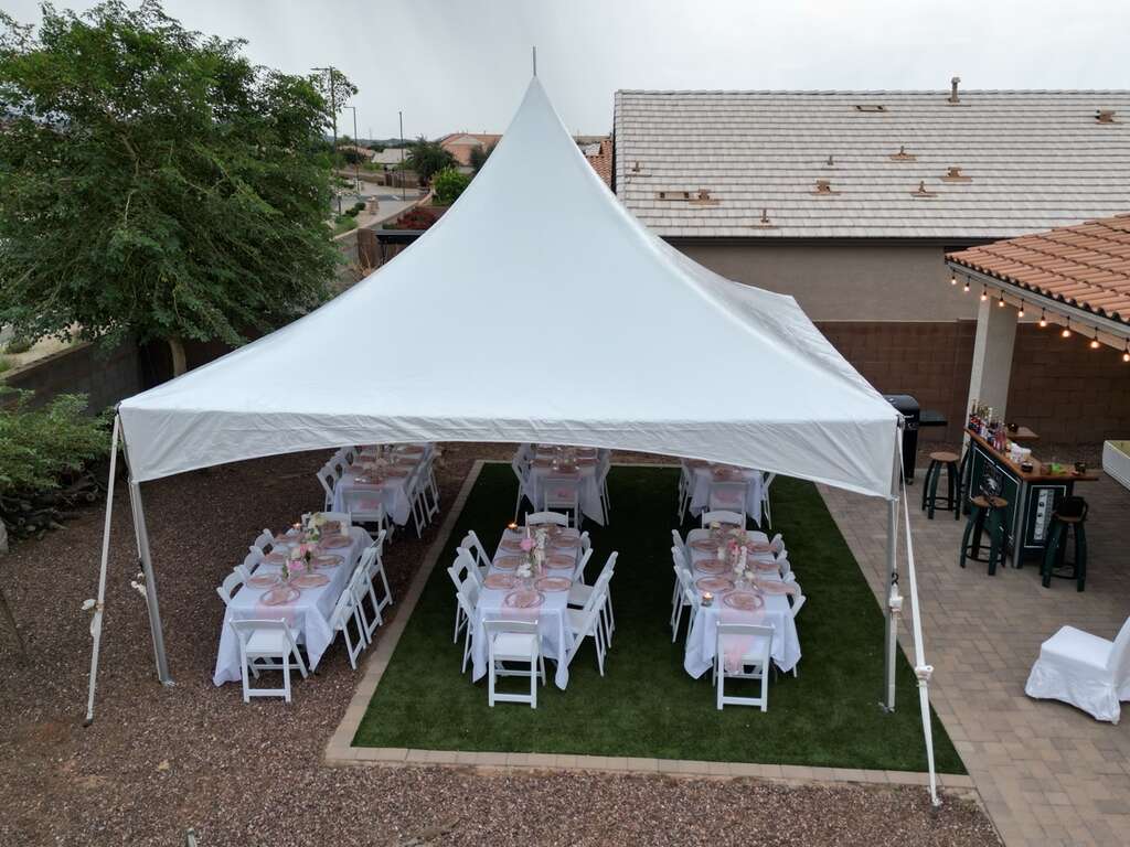 20x20 high peak tent rental for backyard party setup in Goodyear Arizona