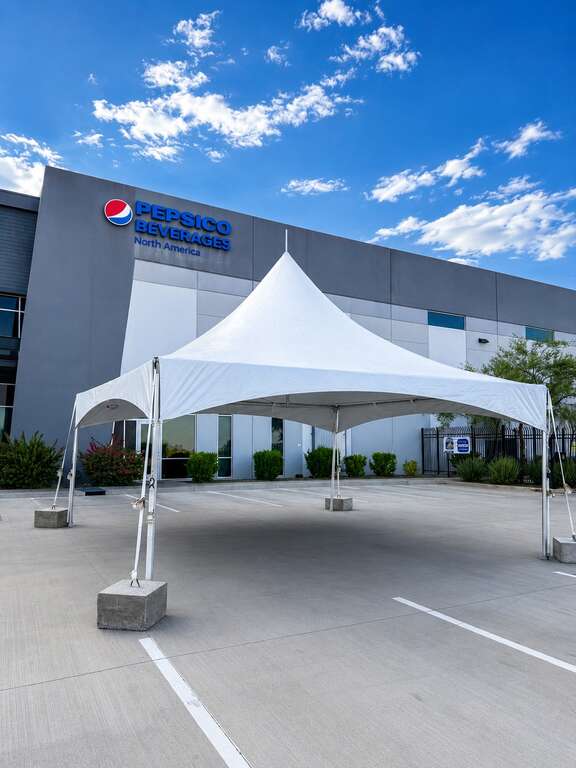 20x20 high peak tent rental installed for Pepsi Beverages North America corporate event in Goodyear Arizona