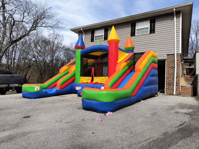 Multi-Colored Bounce House with Double Water Slide