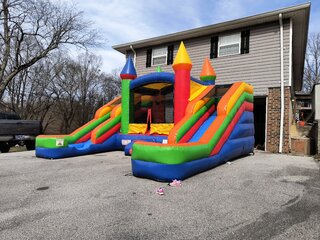 Multi-Colored Bounce House with Double Water Slide