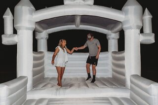 White Castle Bounce House with couch area in front