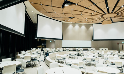 tent with tables and chairs set for an event