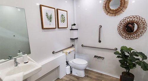 Luxury restroom trailer interior by Grand Restrooms in Charlotte.