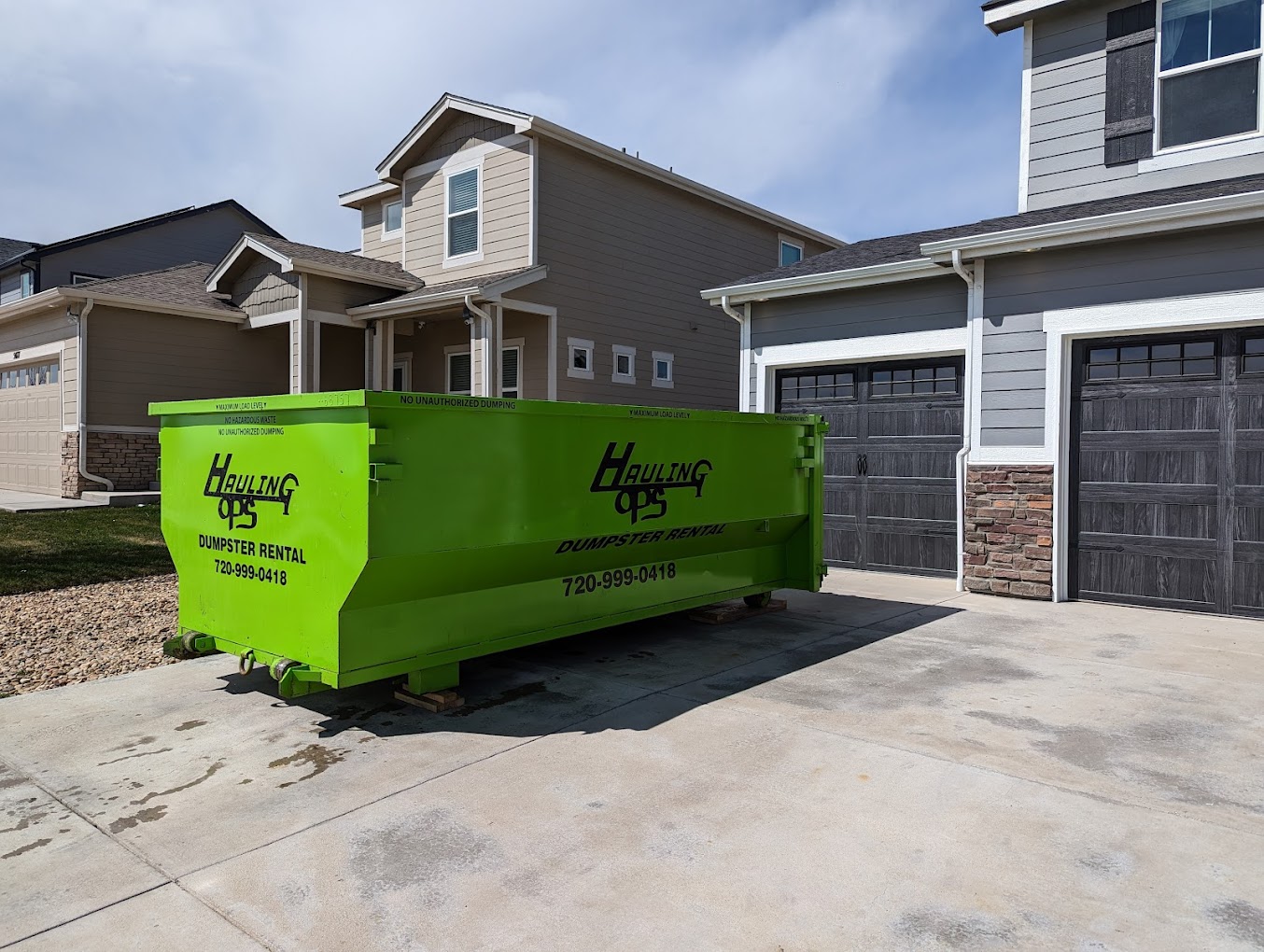 construction dumpster rental services at hauling ops