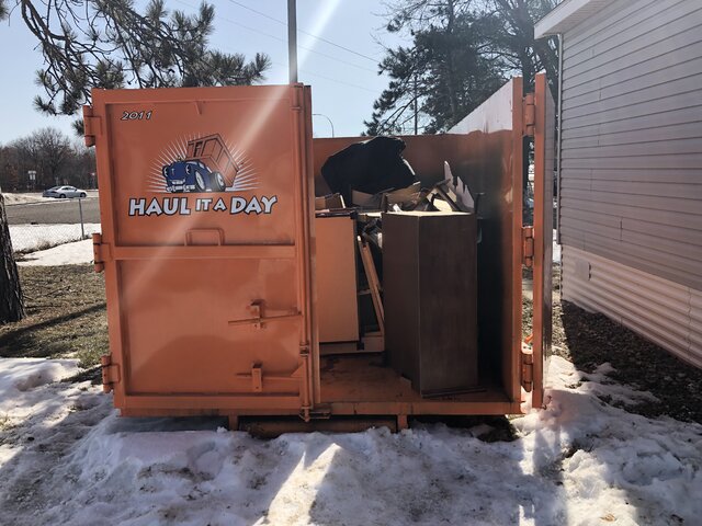 Our double barn style doors open for easy loading. Another reason homeowners prefer Haul it a Day Dumpster Rentals