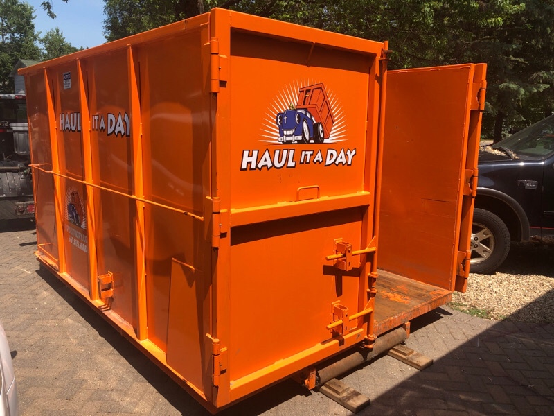 Photo of Orange Haul it a Day 20 Yard Rolloff Dumpster Rental with open double door