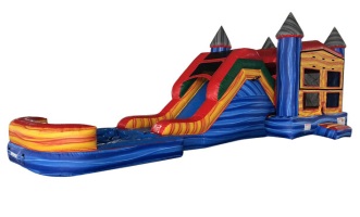 Rainbow marbled bounce house combo with slide set up for a backyard party in Abilene, TX