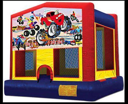 Monster Truck Panel On A Red And Blue Bounce House / With Basketball Goal
