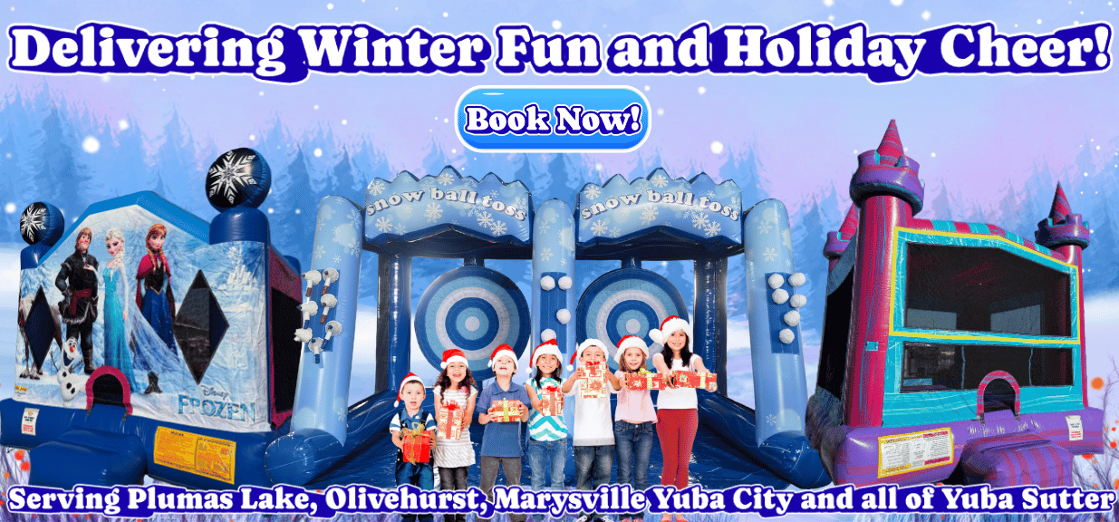 Winter themed  banner with jump houses, snow ball toss game and kids in winter gear