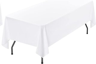 White disposable linen style table covers