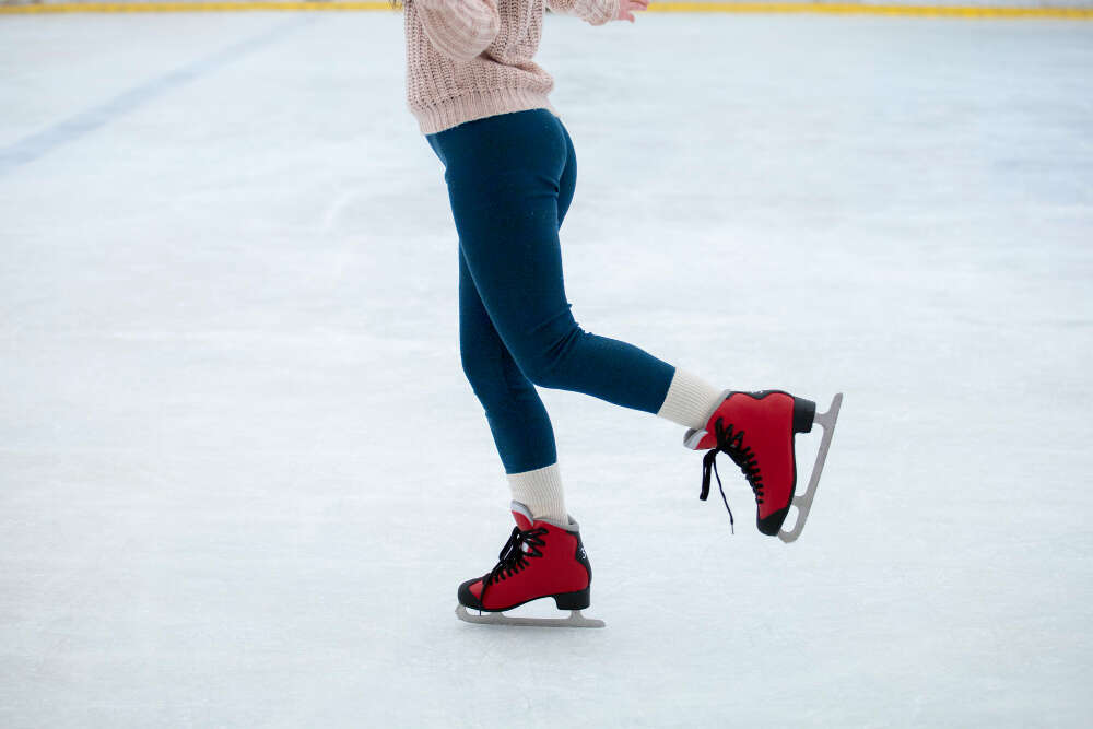 Person ice skating at a Hop A Lot event Person ice skating at a Hop A Lot event
