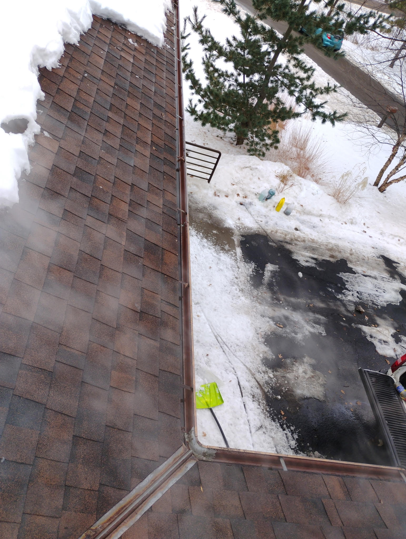 Cleared gutter system after professional steam ice removal