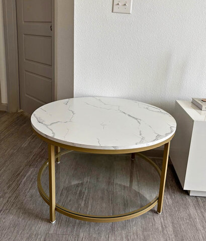 Create coffee table with gold frame 