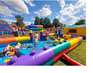 MOMMY AND ME INFLATABLE PLAY LAND FILLED UP WITH TODDLER TOYS 