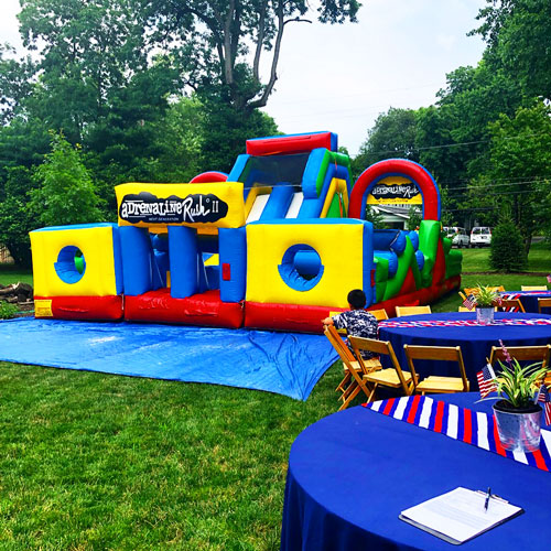 inflatable obstacle course at a party
