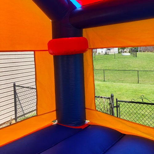 paw patrol bounce house with a basketball hoop