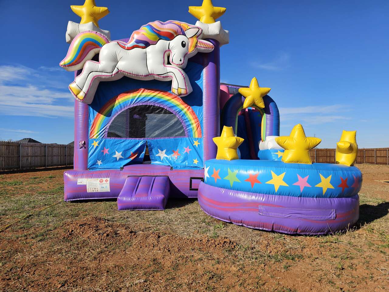 unicorn combo bounce house front view