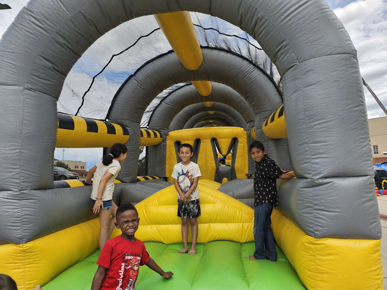 Boy enjoying a water slide rental in OKC