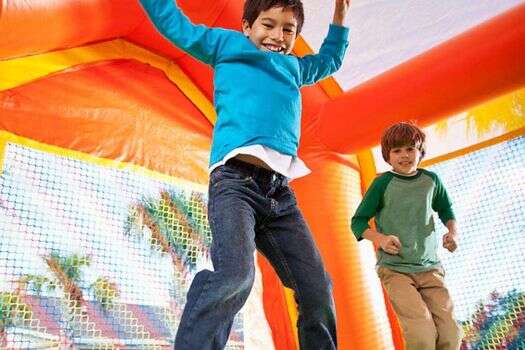 Kids having fun in a bounce house in Oklahoma City