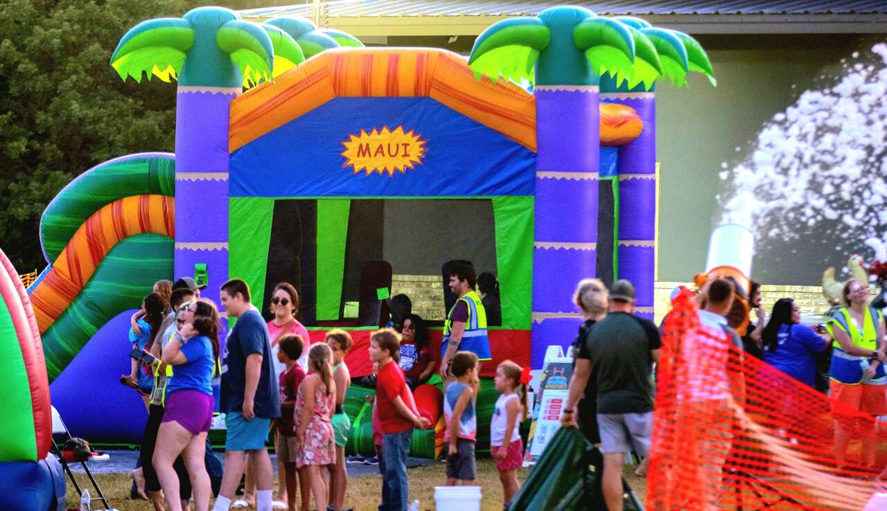 Rainbow water slide rental for OKC parties