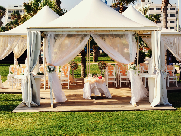 Elegant white event tent setup by Jayden Elegant white event tent setup by Jayden