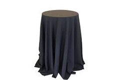 132" round black linen on cocktail table