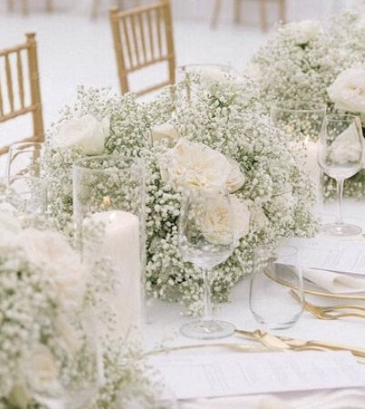 Babies Breath/ white roses centerpiece