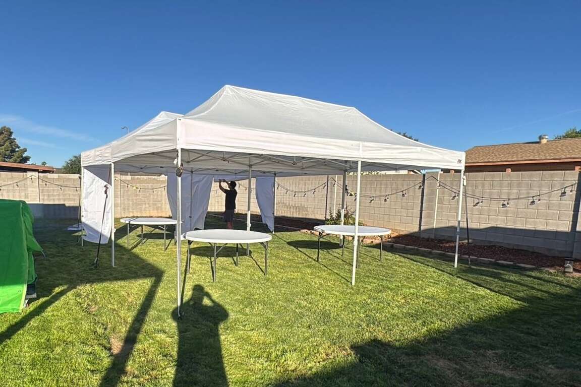 20x20 canopy tent rental fully set up for an outdoor event