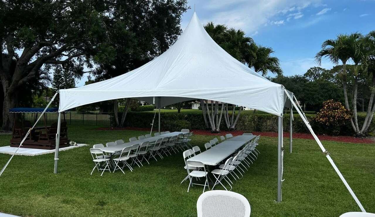 Event setup with chairs, tables, and tents from Jolly Times in Florida Event setup with chairs, tables, and tents from Jolly Times in Florida