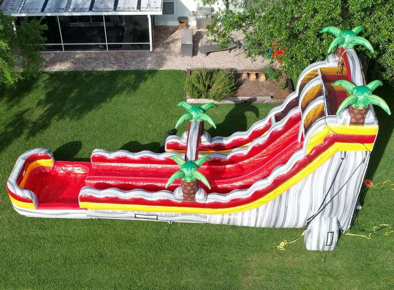 Backyard party water slide rental in Tequesta Florida by Jolly Times Backyard party water slide rental in Tequesta Florida by Jolly Times