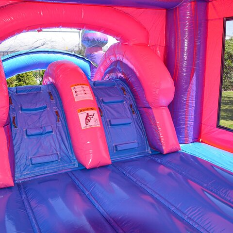 Purplish dual-lane inflatable combo rental with splash zone in Knightdale, NC