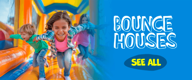 Kids laughing and running through a bright, colorful bounce house rental. Click to view all bounce houses from JT Jumpers and More.