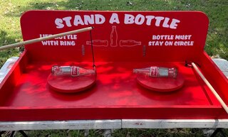 Stand A Bottle Carnival Game