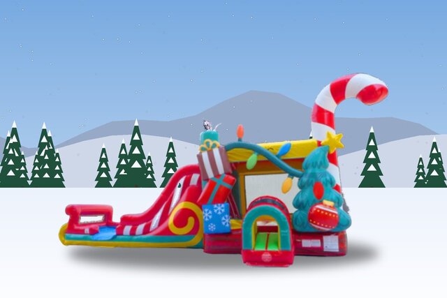 Christmas Wonderland mega combo with a sleigh-style slide and giant candy cane in a snowy mountain yard