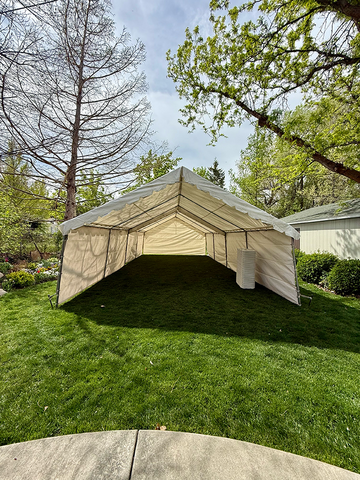 20x40 wedding tent rental with tables and chairs setup for outdoor reception in Utah